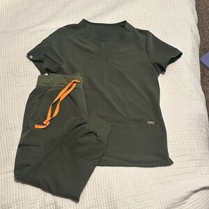 Figs 3 pocket scrub top and Zamora Joggers in Olive with Orange Accent